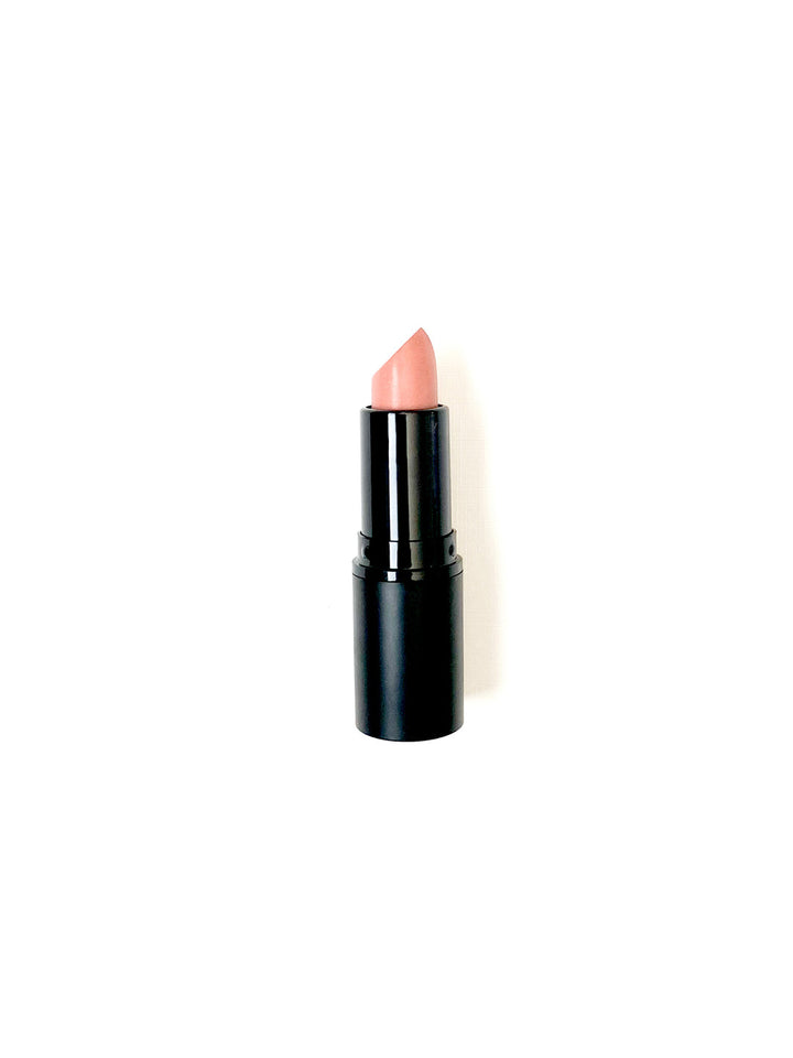 A small pinkish lipstick on a white background. #colour_brandi