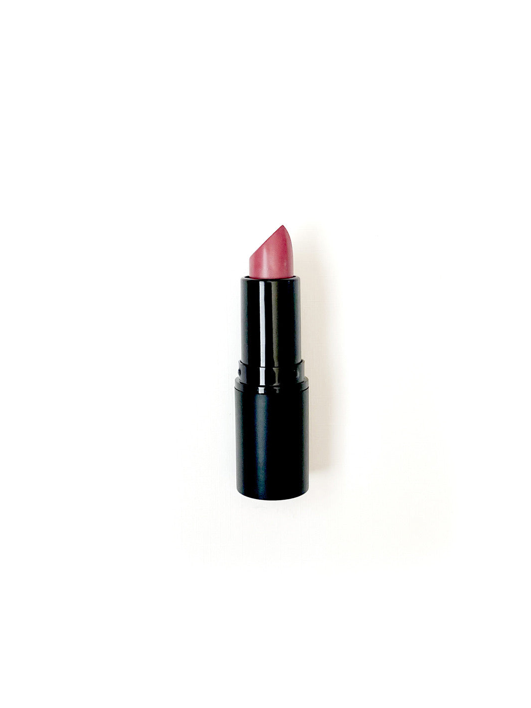 A small darker pinkish lipstick on a white background. #colour_michelle