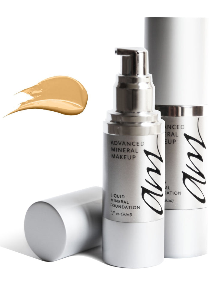 Two advanced mineral makeup products in small pump bottles on a white background in front of a paint swatch in the color called 'ginger-snaps'. #colour_ginger-snap